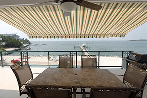 Retractable awning shielding a patio