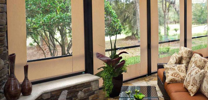 Retractable motorized screens offer privacy, protect inside living space from insects and sun glare