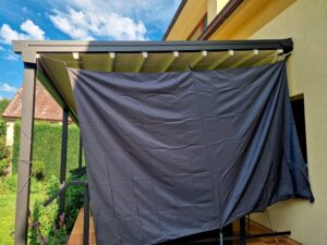 Makeshift privacy and protection screen for outdoor patio