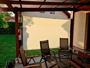 Pergola cover over outdoor living space on patio 